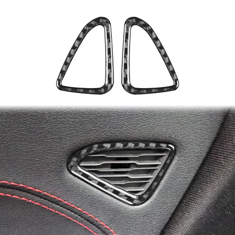Black carbon-fiber door air vent trim stickers installed on a car door panel