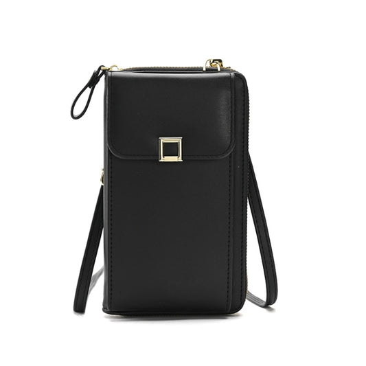 Black cross-body shoulder bag with flap front and gold-tone clasp