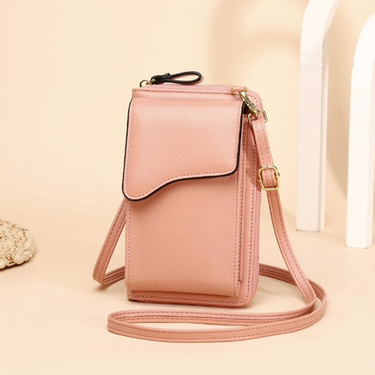 Pink crossbody phone bag with front flap and adjustable shoulder strap.