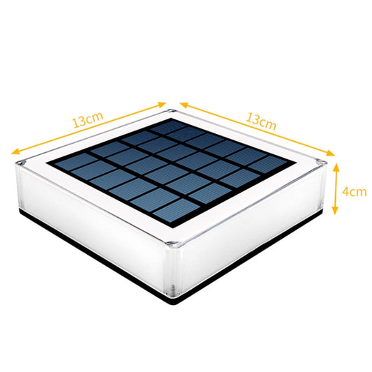 Square solar deck light with black solar panel and clear edge, white base