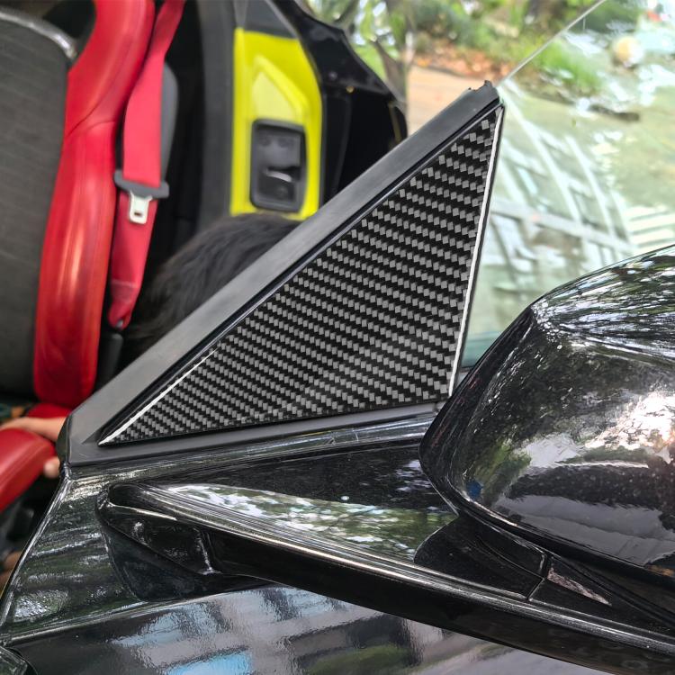 Carbon fiber-look A-pillar trim sticker panel on car near side window