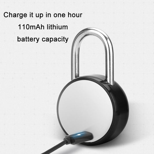 Rechargeable fingerprint padlock with USB charging cable connected to black base