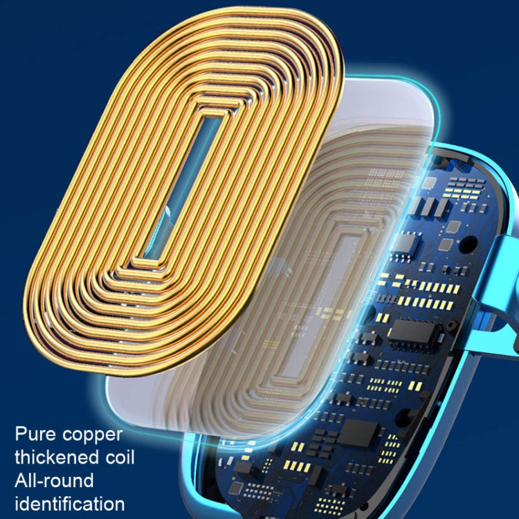 Wireless charging coil close-up inside blue phone holder with copper loop antenna