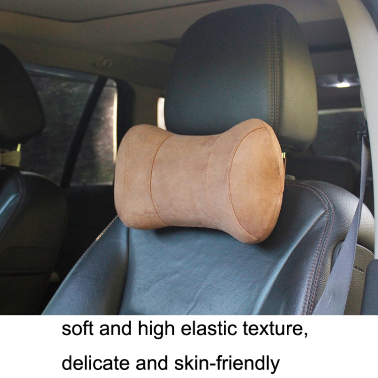 Car headrest neck pillow in beige on front seat with curved cervical support
