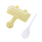 Handheld sushi roll mold tool with yellow frame and clear ridged press, plus white paddle