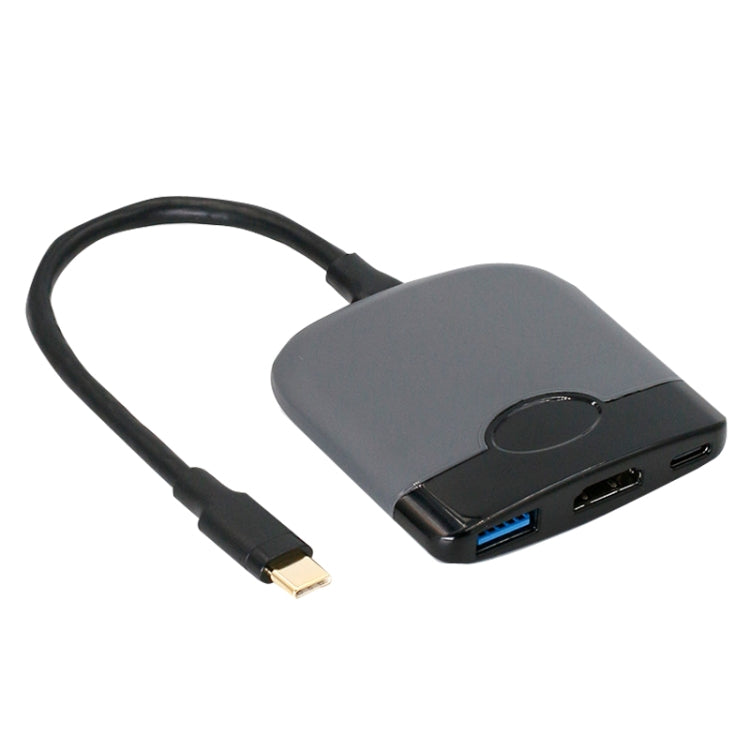 Gray and black portable expansion dock base with two ports, blue USB, and black cable with gold connector