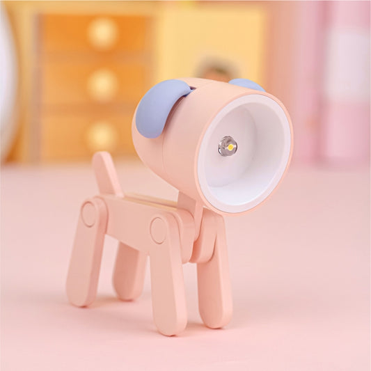 Pink dog-shaped LED mini desk lamp with blue ears and round headlight