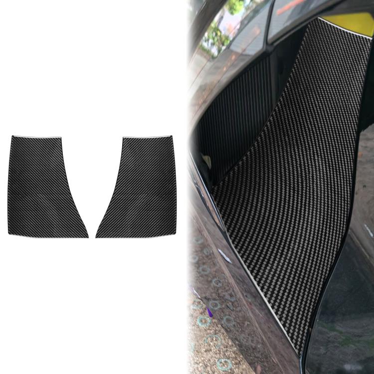 Pair of black carbon-fiber exhaust port stickers near car side opening