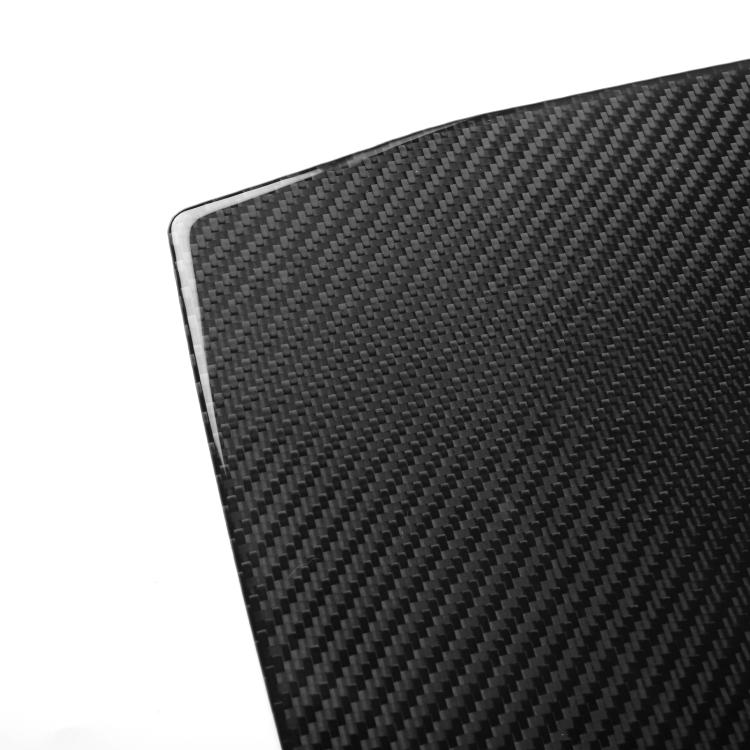 Black carbon-fiber texture exhaust port sticker panel with diagonal weave pattern