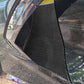 Black carbon-fiber exhaust port sticker panel installed on car side