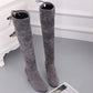 Gray over-the-knee suede boots with thick high heel and lace-up cuffs