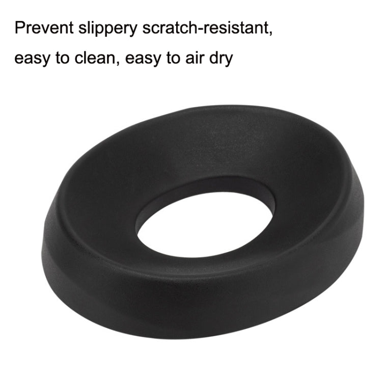 Black round helmet support pad with center hole and smooth matte finish