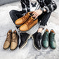 Collection of lace-up winter work boots in tan, black, and green colors