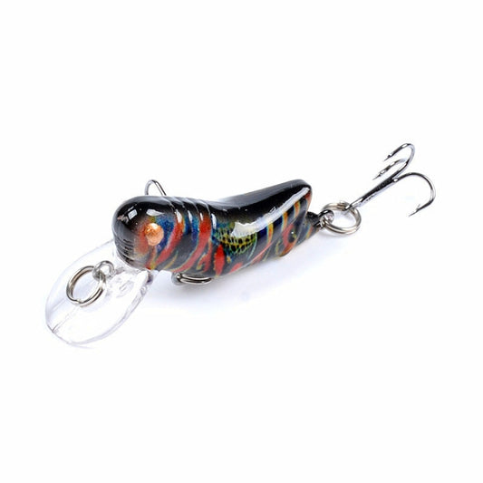 Hard plastic fishing lure with multicolor body, clear lip, and metal treble hooks