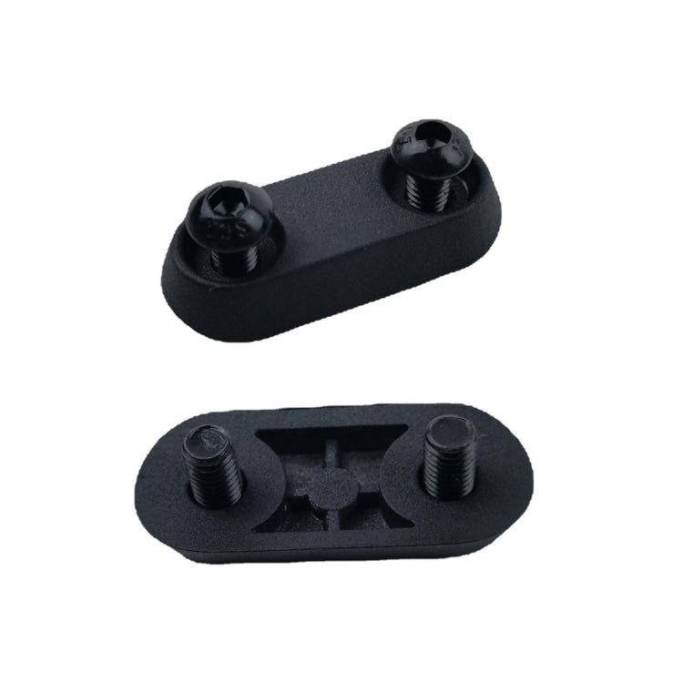 Black fixed block with two raised bolts and two mounting holes