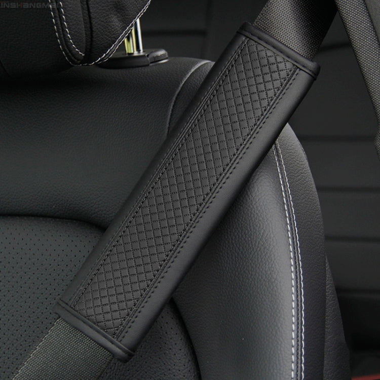 Car seat belt shoulder cover protector in dark textured leather with light edge stitching