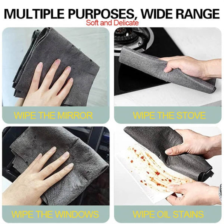 Grey microfiber cleaning cloth in use, hand wiping a surface