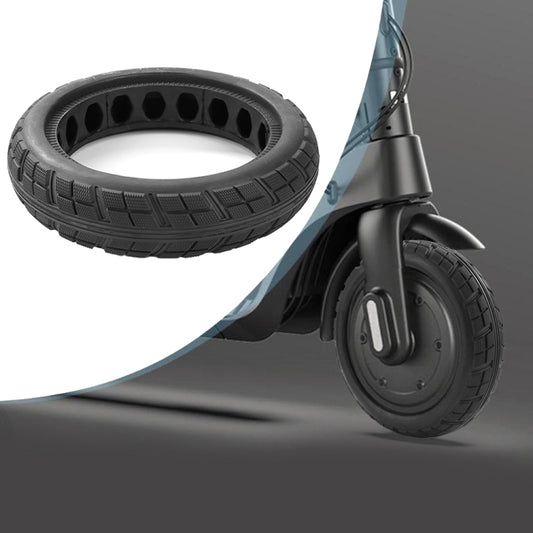 8.5-inch scooter tire, black rubber with chunky tread and hollow core