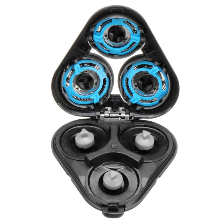Open black holder head accessory with three blue shaving module rings