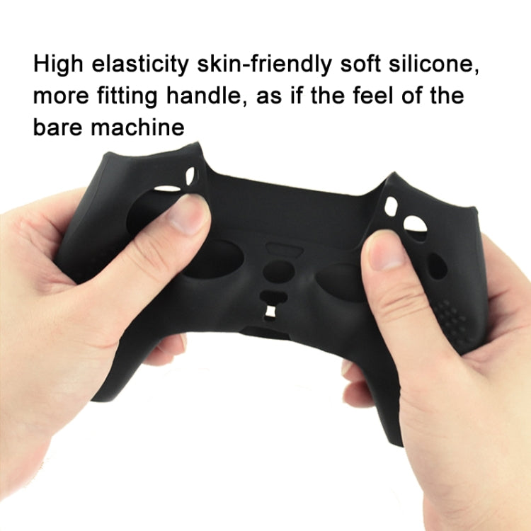 Black silicone controller cover set held by hands, with cutouts for buttons and sticks