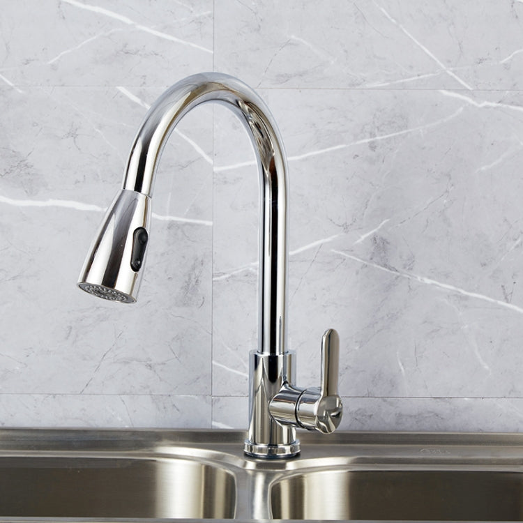 Chrome pull-out kitchen faucet with single lever handle and handheld spray head