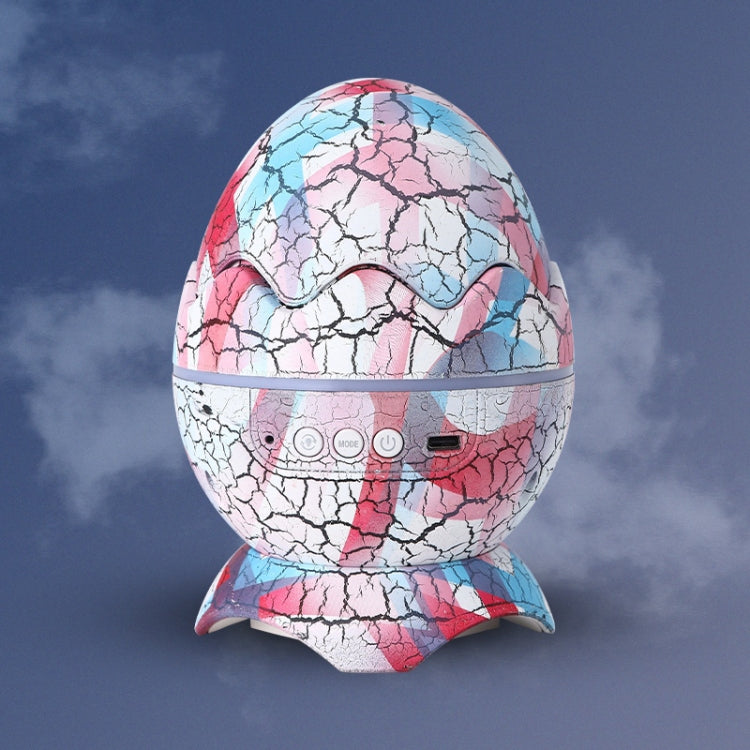 Pink and blue LED dinosaur egg night light with crackled shell and buttons