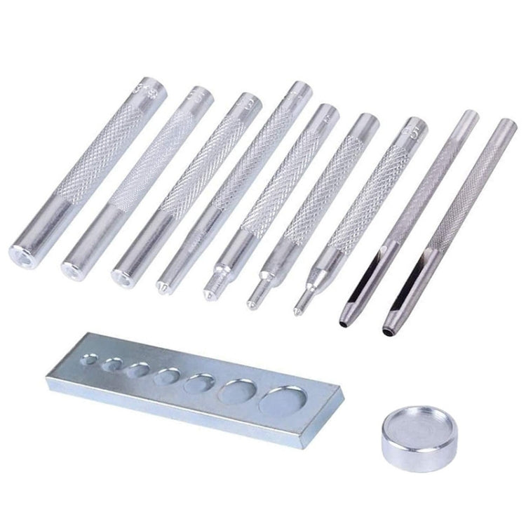Metal leather stamping punches with textured metal handles and silver accessory tray