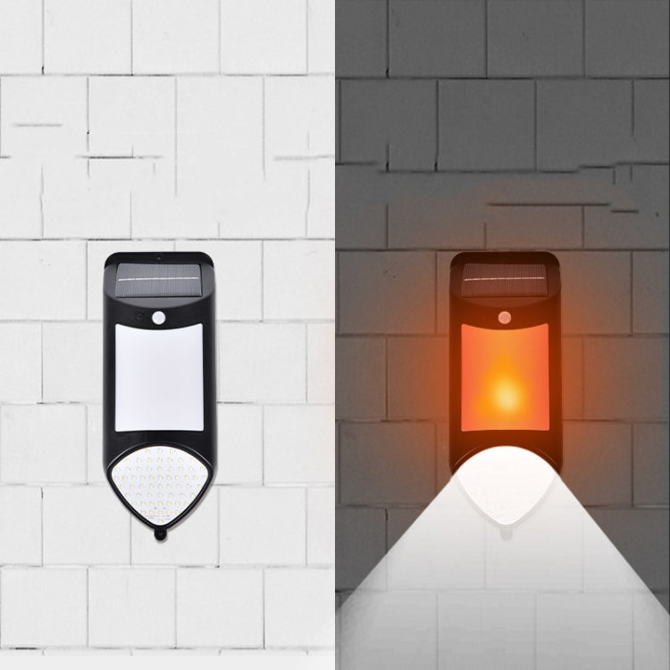 Solar LED flame-style wall light pair, black housing with glowing orange and white panels