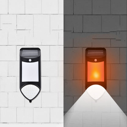Solar LED flame-style wall light pair, black housing with glowing orange and white panels