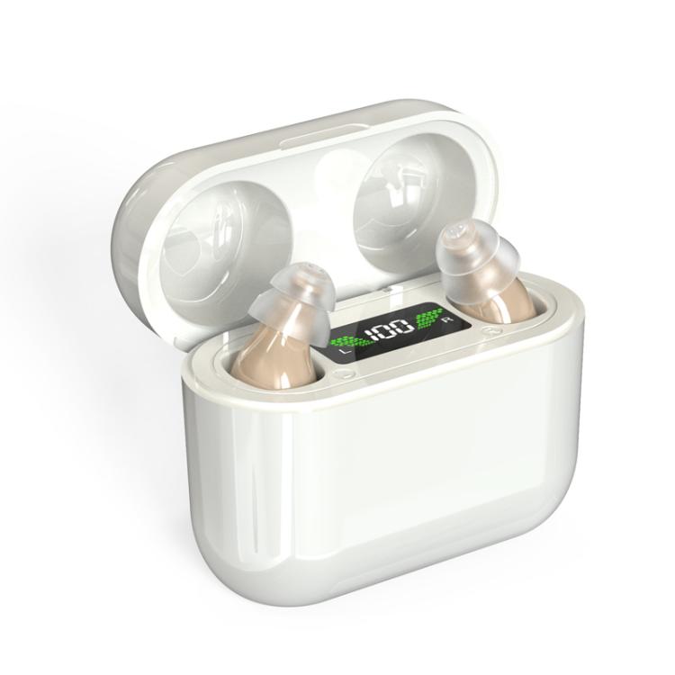 White digital hearing aid charging case with three earbud-style devices and display window