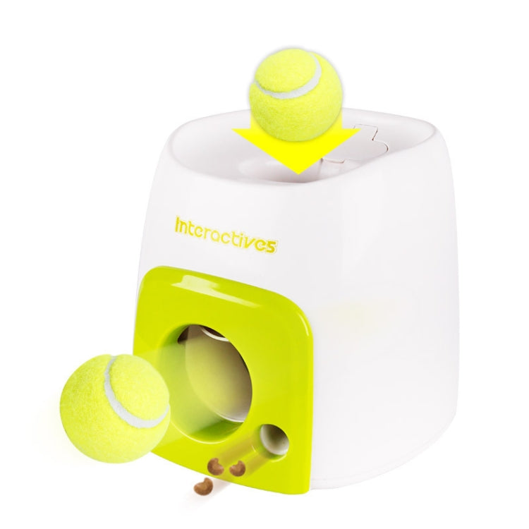White and green interactive dog treat machine with tennis ball on top and ball at side