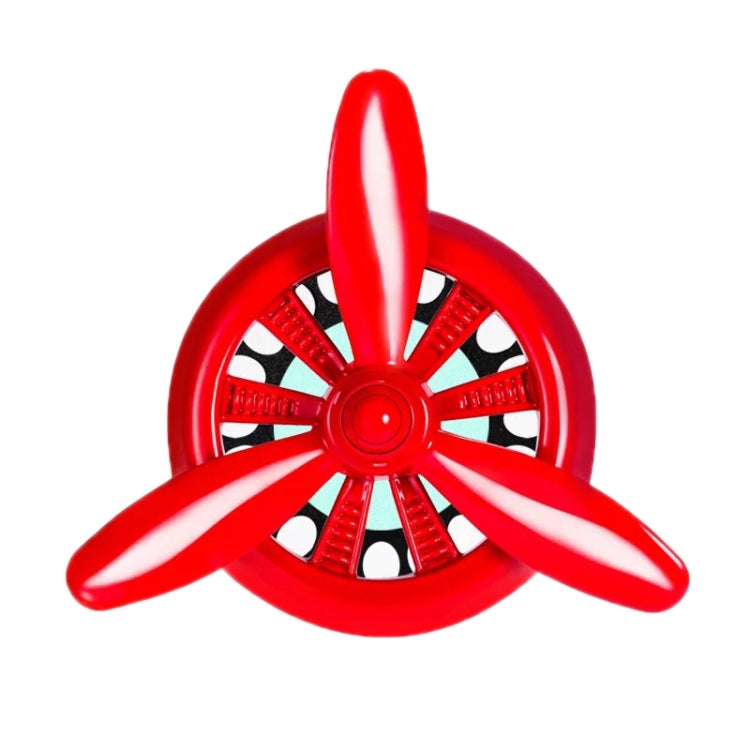 Car air outlet perfume swivel fan, red three-blade propeller with central hub
