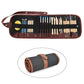 Clay carving tool set laid out in a brown fabric roll, assorted sculpting tips
