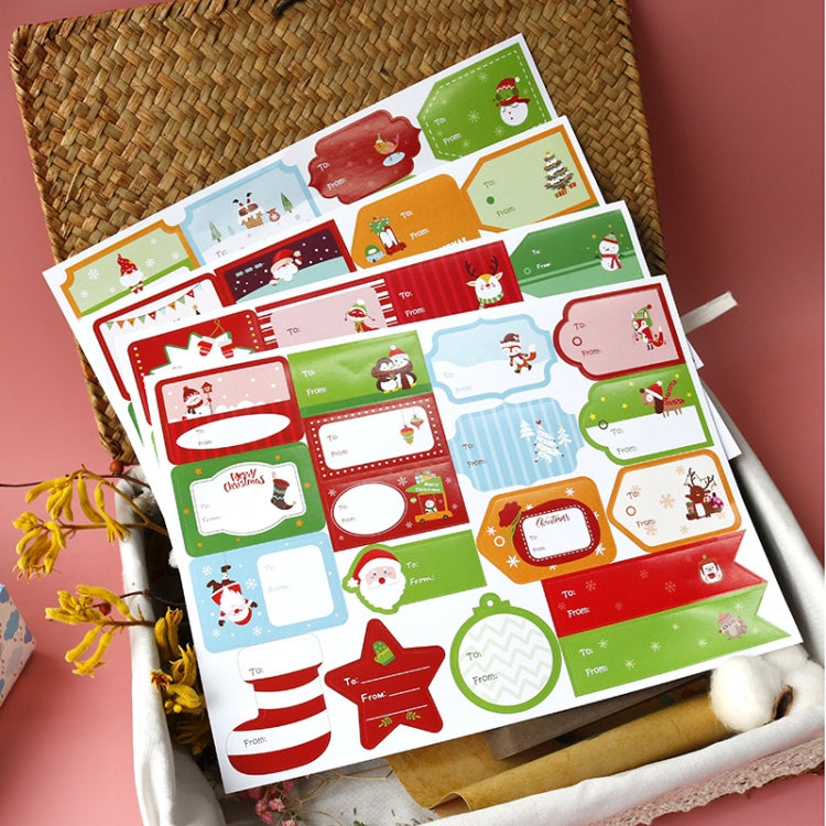 Christmas sticker sheets in a stack with assorted label and tag designs