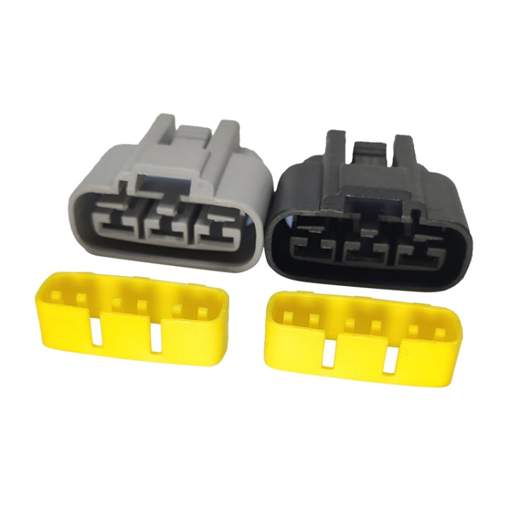 Motorcycle rectifier plug housings with yellow inserts, gray and black connectors