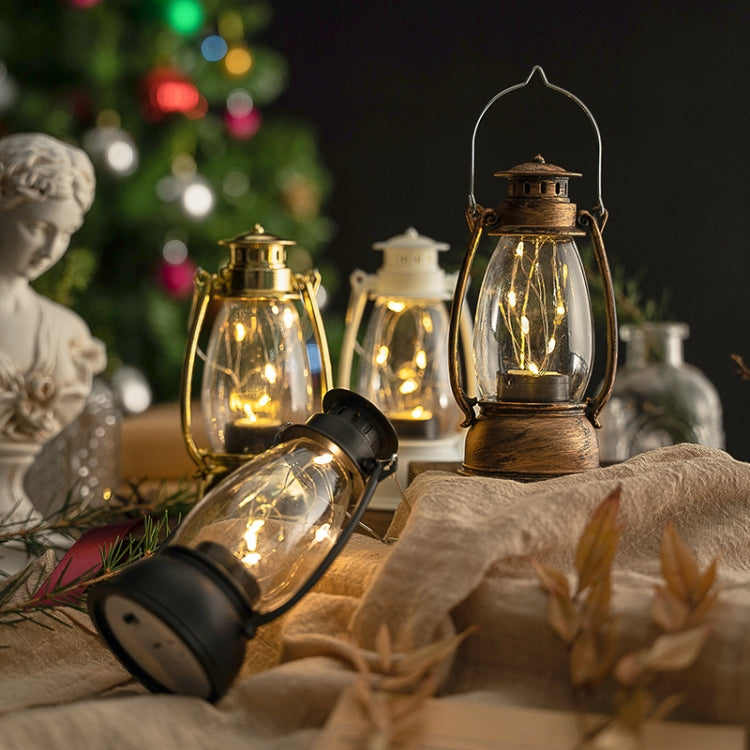 Bronze retro lantern with clear glass globe and warm flame-style light