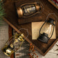 Retro oil lamp lanterns with clear glass globes, bronze and black metal frames