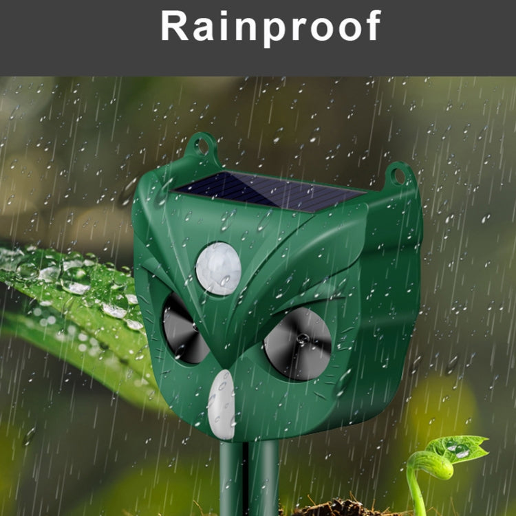 Green outdoor solar ultrasonic repellent with waterproof hood and two speaker grille vents