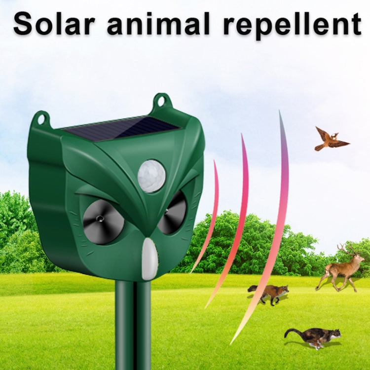 Green solar ultrasonic animal repellent head with solar panel top and white indicator light