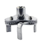 Oil filter element removal wrench with spoked ring grip and central socket