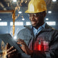 Mini pen LED flashlight in use, dark gray body glowing red in worker’s hand
