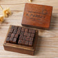 Wooden alphabet stamp set in open box with cursive-style uppercase letters and blocks