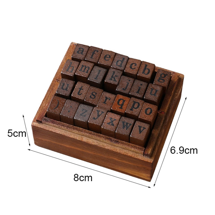 Wooden stamp block case with alphabet tiles; dimensions shown: 8cm by 6.9cm