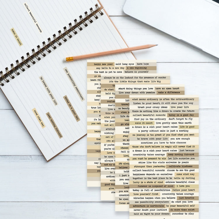 Vintage quote sticker labels on small sheets, cream paper with black serif text