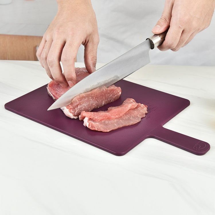 Plastic cutting board for raw prep with non-slip base; purple board with knife