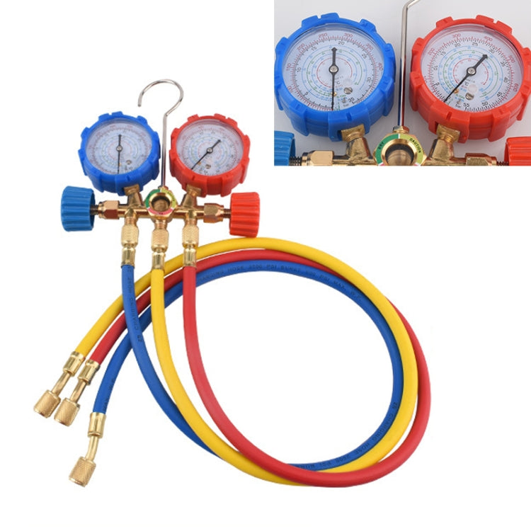 Dual gauge refrigeration valve manifold with brass connectors and blue/red meters plus hoses