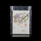 Clear bubble mailer envelope with a floral card inside, wrapped for shipping