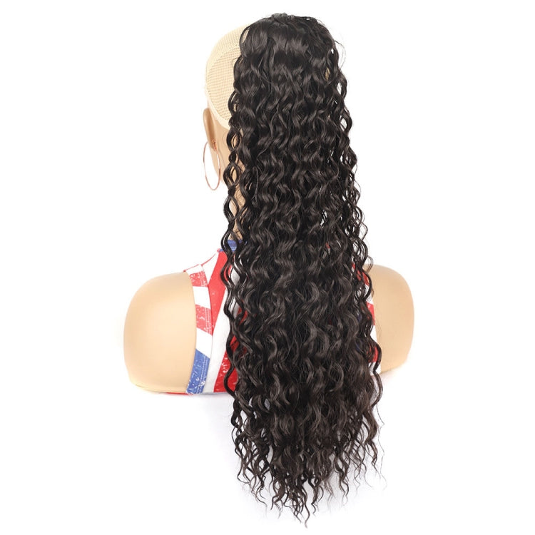 Curly ponytail wig with long black curly hair, side view on mannequin