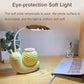 Cartoon snail LED desk lamp with soft illuminated shade, yellow body