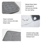 Gray heating pad blanket fabric close-up with detachable plug and edge stitching details